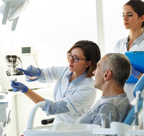 Norwood dental team preparing patient for implant surgery