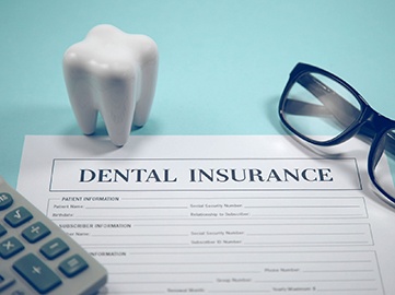 Dental insurance form on blue background