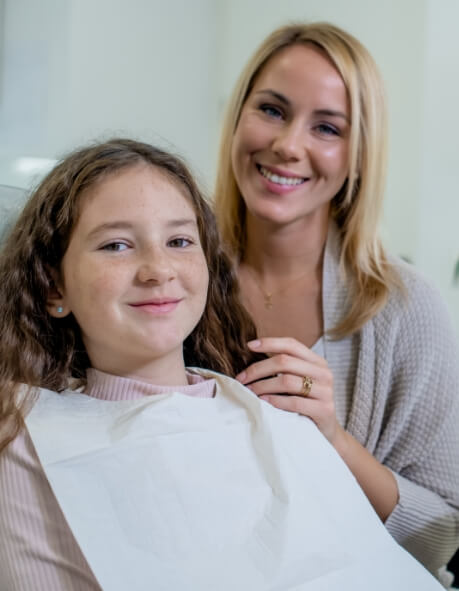 Girl smiling in dental chair