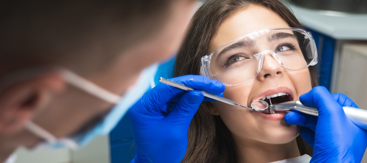 Woman receiving root canal treatment in Norwood
