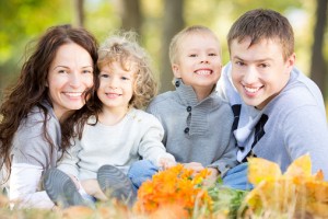 Family with healthy smiles from the trusted Norwood Dentist