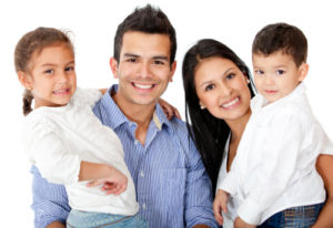 Happy family smiling thanks to family dentist in norwood