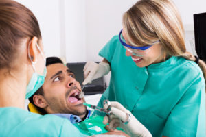 Fearful man at dental office