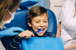 little boy in dental chair