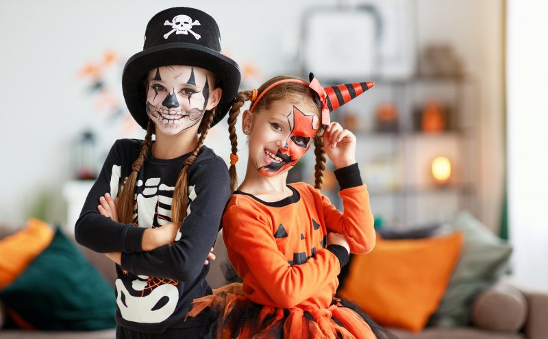 two young girls dressed up for Halloween 