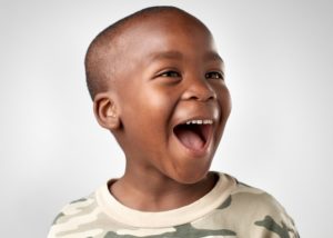 Smiling little boy excited to see his family dentist in Norwood