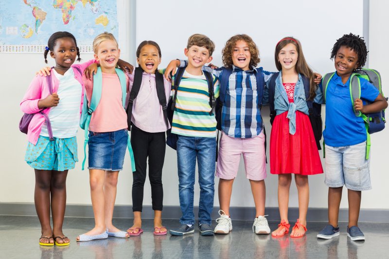 group of kids smiling in Norwood