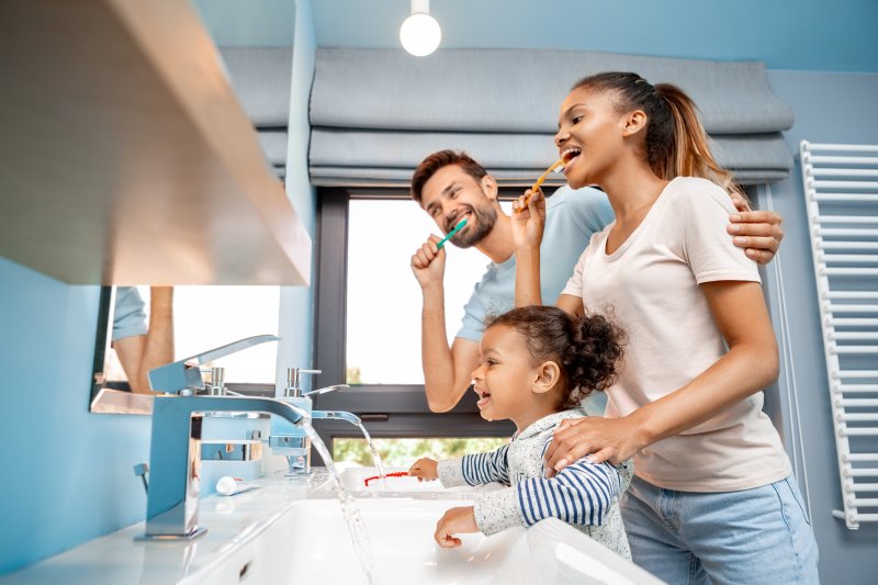 portrait of a family brushing